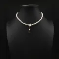 Natuurlijke zoetwaterparel ketting met parelmoer bloemhanger, elegante choker ketting. - Bloem Kwastje Hanger Parelketting