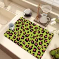 Detailed view of green leopard print diatomaceous earth dish drying mat for kitchen counter. - Leopard Print Series - 5