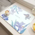 Detailed view of floral diatomaceous earth kitchen drying mat on counter with coffee setup. - 20*30cm / Mengning