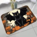 Halloween doormat detail showcasing cute black cat and pumpkin pattern for festive home decor. - Halloween - 12