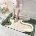 Detailed view of the soft fluffy green and white absorbent bath mat for bathroom floor. - 40*60cm / 3D Visual Plush - 2