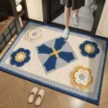 Detailed view of a Chinese style wool knit absorbent floor mat with floral patterns for home entryway. - Wool Style 26