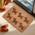 Soft faux cashmere bathroom mat with cute brown dog and blue bowtie pattern detail view - 40x60cm / Animal Paradise 4