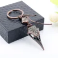 Vintage Viking raven skull keychain with Nordic runes and Vegvisir symbol - Copper