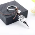 Close-up of Viking raven skull keychain featuring detailed Vegvisir rune engraving - Silver