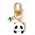 Close-up detail of a cute panda enamel keychain with a green bamboo charm. - G-1523 -4