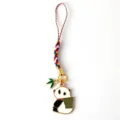 Detail view of cute panda charm with colorful braided strap and bamboo leaf accessory - G-1539 -1