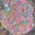 Close-up of colorful pastel heart-shaped sequins and glitter accessories for DIY crafts and decor. - Mixed Hearts Sequins / 20g