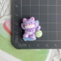 Cute purple cat resin charm detail view, perfect for DIY phone cases, hair clips and accessories. - Purple Cat on Lounge Chair