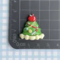 Resin Christmas tree charm detail view, perfect for DIY phone cases and hair clips decoration. - Apple Christmas Tree