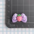Close-up detail of cute purple bow resin strawberry craft accessory, DIY handmade item. - Purple Big Bowknot Small Strawberry