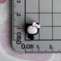 Mini black pink resin charm detail view, cute bow cartoon accessory for DIY crafts and phone cases. - Bow Tie Cat Mirror / Mini Size / Black and Pink Color Scheme