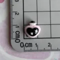 Mini black pink resin heart bottle charm detail showing size on grid ruler for DIY crafts. - Heart Wishing Bottle / Mini Size / Black and Pink Color Scheme