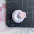 Close up detail view of the cute resin donut charm with pink flower, shown with size measure. - Purple Peony Flower Donut (07)