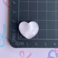 Pink sparkly resin heart charm detail view, cute DIY craft accessory for phone cases and hair clips. - Pink Glitter Heart