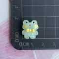 Mini resin frog charm detail shot, cute animal DIY accessory for phone case and crafts. - Green Luminous Frog
