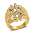 Macro view of gold-plated hip-hop ring featuring an iced-out dollar sign symbol - Size 7 / Gold