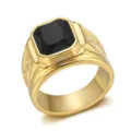 Detailed view of a gold titanium steel ring with dragon engraving and black gem. - Size 7 / Black