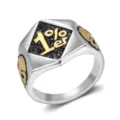 Macro view of a punk-style stainless steel ring featuring 1%er and gold skull details - Size 7 / Two-Tone Gold