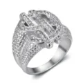 Detailed macro view of hip hop dollar sign ring with sparkling pavé rhinestones - Size 7 / Steel