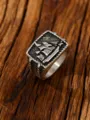 Macro view of vintage stainless steel sailing ship ring with embossed nautical details - Size 7 / Steel