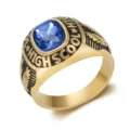 Macro detail view of vintage stainless steel eagle wing ring with blue square gemstone centerpiece - Size 7 / Gold and Blue