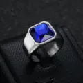 Close-up detail of a men's stainless steel ring with a large blue square gemstone - Size 7 / Silver Color Sapphire Blue Gem