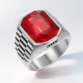 Close-up of a men's stainless steel ring with a large red rectangular gemstone - Size 7 / Red