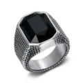 Detailed macro shot of a retro stainless steel ring with a large black zircon stone - Size 7 / Black