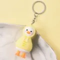 Close-up detail of cute yellow duck cartoon keyring pendant with metal chain and PVC soft body. - Hoodie Duck / 10 Pieces Pack