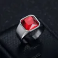 Close-up of men's stainless steel ring with a large square red gemstone inlay - Size 7 / Steel Red Zircon