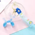 Porte-clés chien ballon couleur bonbon, pendentif voiture sable mouvant acrylique cadeau. - Bleu
