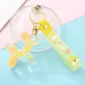 Porte-clés chien ballon liquide brillant couleur bonbon acrylique sac pendentif cadeau - Jaune