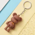Porte-clés ours marron mignon avec design cool, parfait comme pendentif de sac et cadeau original. - Marron