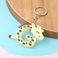 Adorable porte-clés lettre G motif girafe, anneau en métal et pendentif sac animal mignon. - Lettre G