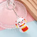 Süßer Winkekatze Schlüsselanhänger, weiches PVC 3D Puppen Anhänger, tolle Dekoration. - Trommelhalter-Stil