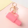 Mini Tumbler Cup Keychain, Portable Lipstick Storage Tube with Cute Butterfly Pendant - Pink