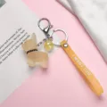 Joli porte-clés en résine chien dessin animé avec lanière jaune, accessoire de sac élégant. - Style Chien Jaune Sangle (Spécial 21#) / 10 Pièces/Paquet