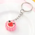 Cute simulation pink cake keychain pendant, creative mooncake bag ornament for girls. - Peach