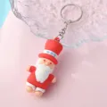 Süßer Weihnachtsmann Schlüsselanhänger aus Silikon als festlicher Taschenanhänger - Weihnachtsmann Stil C (6)