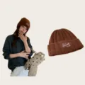 Detailed view of winter warm knitted beanie hat, retro brown wool skull cap for women. - One Size / Brown