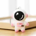 Cute astronaut keychain, cartoon spaceman pendant, white and pink silicone bag charm accessory. - L / Pink