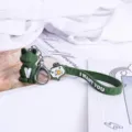 Cute geometric green frog keychain with strap and camera pendant for bags and car keys. - Frog