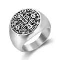 Macro detail of vintage Saint Benedict Medal engraving on stainless steel signet ring - Size 7 / Steel
