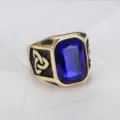 Macro view of men's Viking ring with large blue gemstone and Celtic knot detail - Size 7 / Viking Geometric Style (TR0239) / Gold Blue Resin