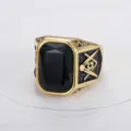 Detail view of gold-toned Masonic signet ring featuring a large rectangular black onyx stone - US 7 (54.3mm) / Gold Tone Black Rhinestone