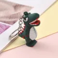 Portachiavi dinosauro simpatico cartone animato in gomma morbida verde ciondolo zaino - Verde Scuro