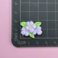 Resin purple flower craft accessory detail, flat back charm for DIY hair clips and phone cases. - Three Purple Flowers