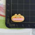 Primer plano detalle de lindo dibujos animados animal pan resina cabujón decoración teléfono. - Pan de Oso Salchicha