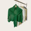 Detailed view of lightweight summer knitted shawl, soft hollow-out fabric, elegant drape design. - 180cm / Grass Green